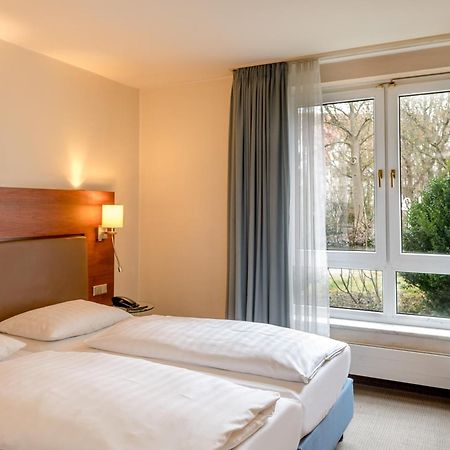 Mercure Hotel Muenchen Airport Фрайзинг Экстерьер фото