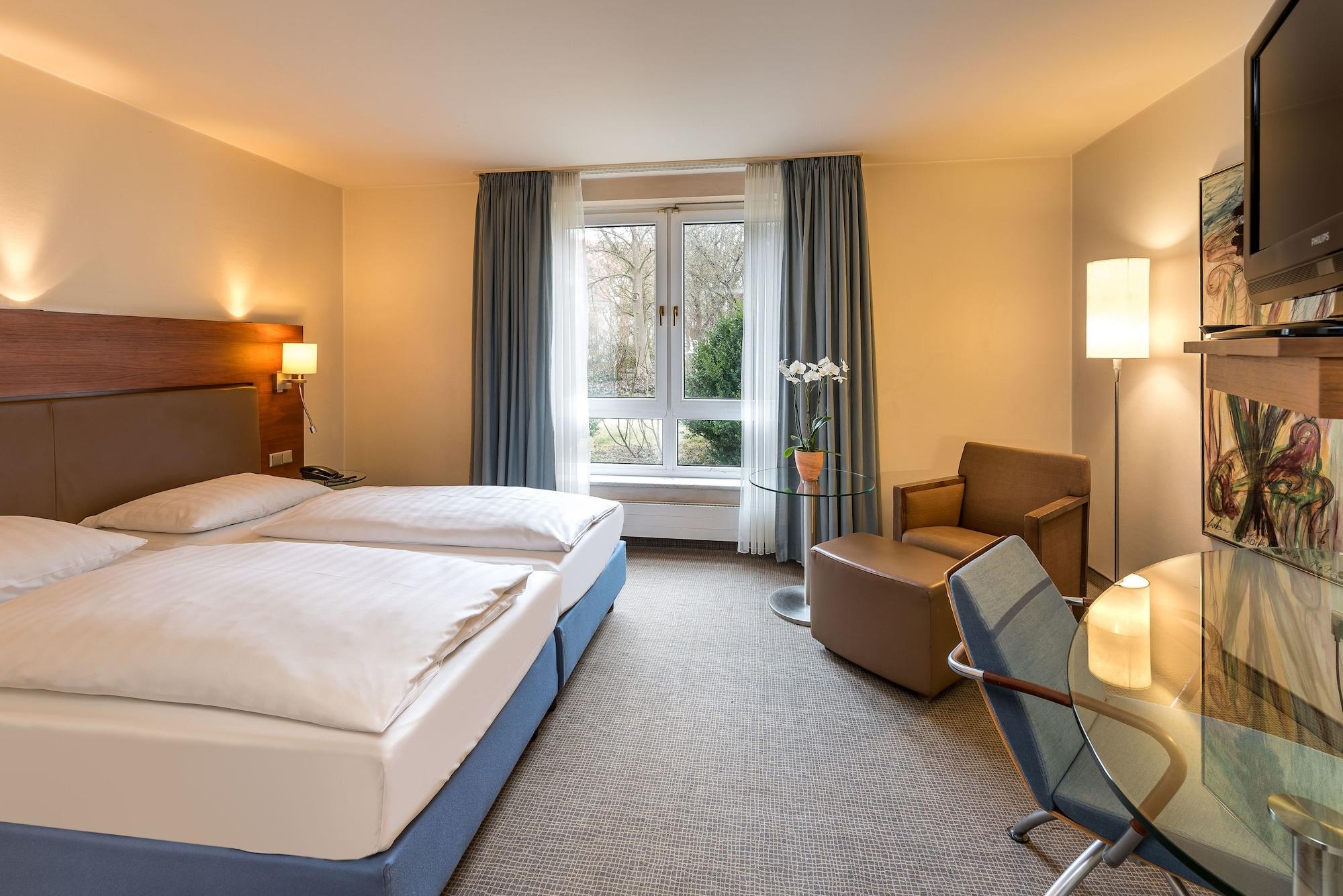 Mercure Hotel Muenchen Airport Фрайзинг Экстерьер фото
