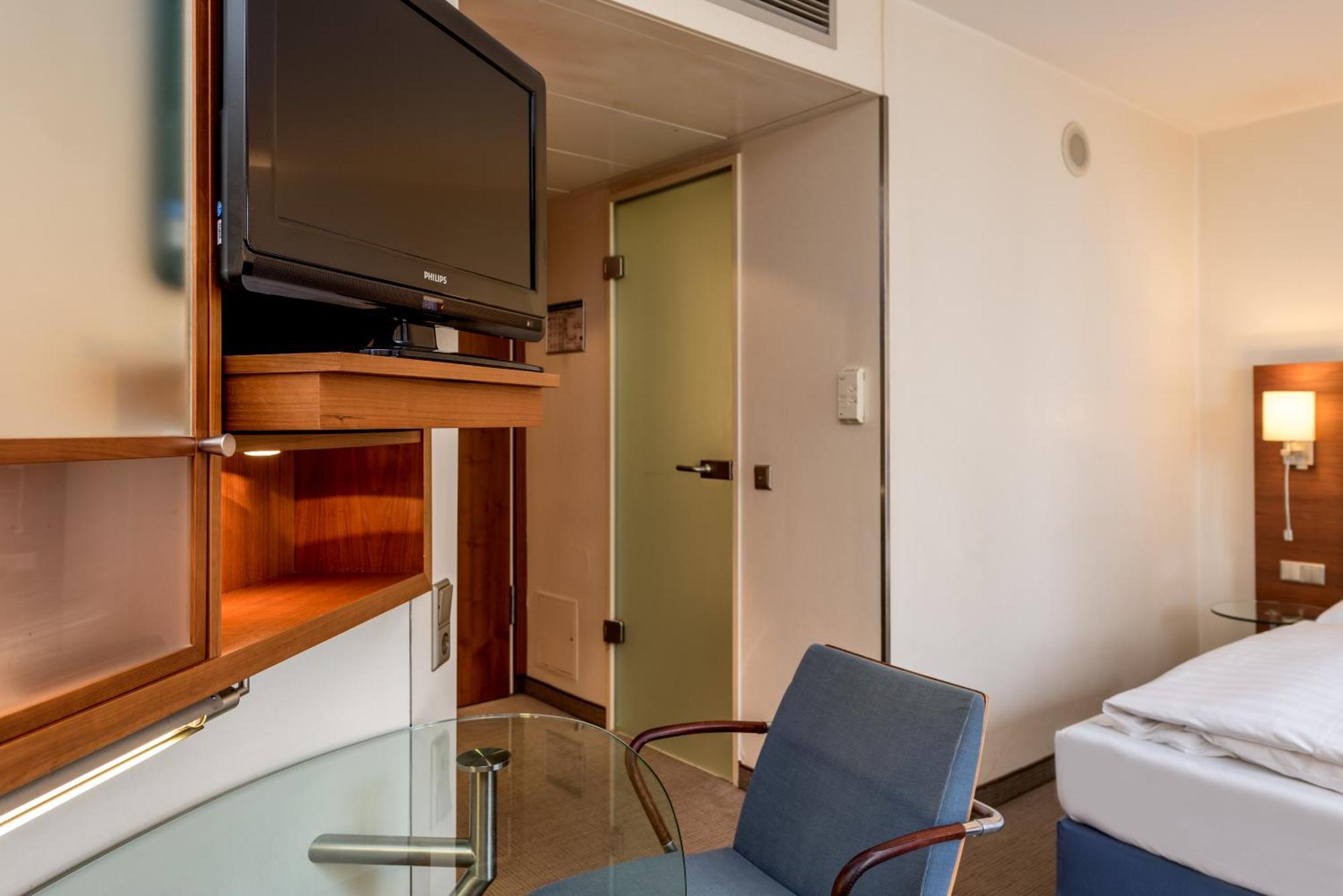 Mercure Hotel Muenchen Airport Фрайзинг Экстерьер фото