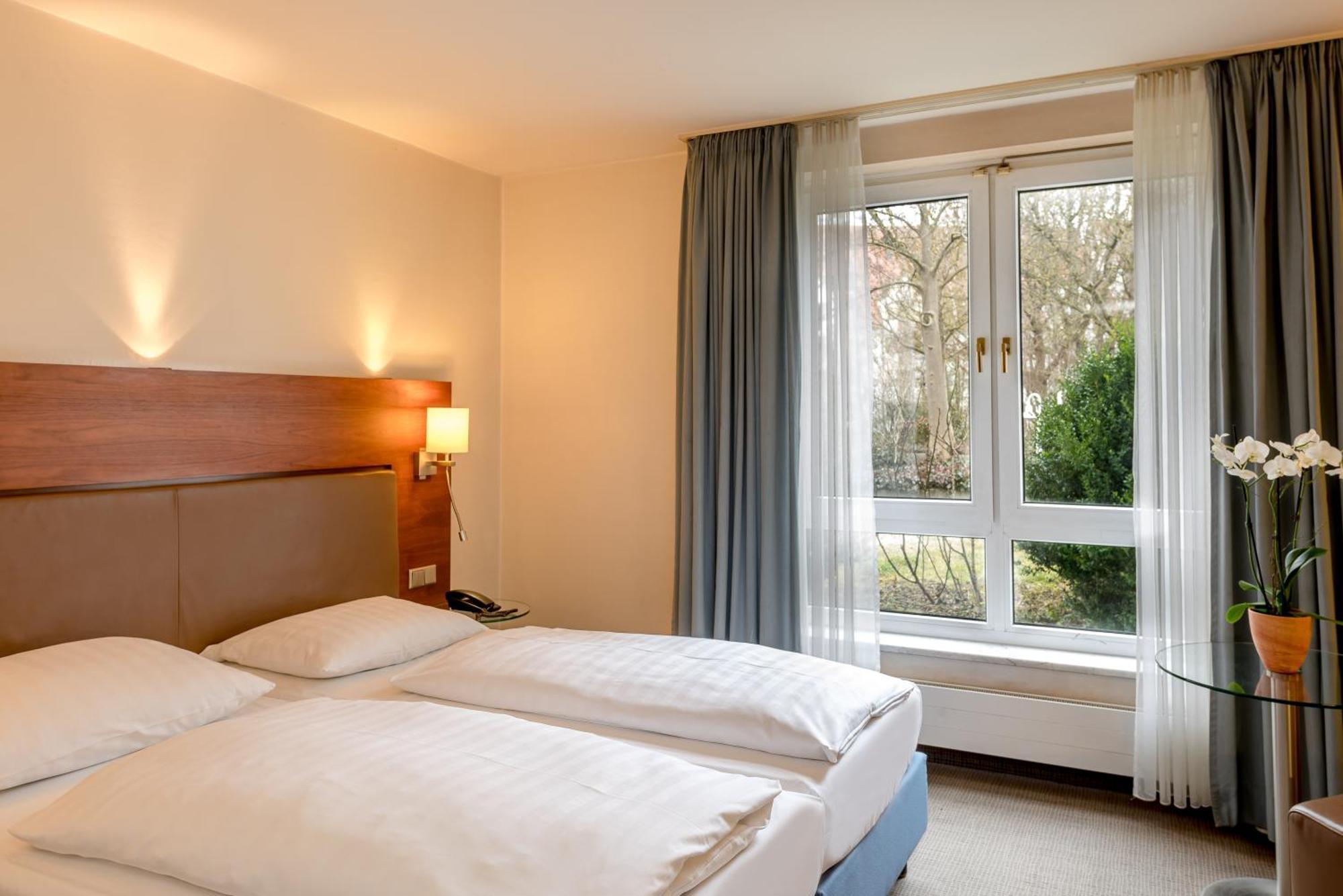Mercure Hotel Muenchen Airport Фрайзинг Экстерьер фото